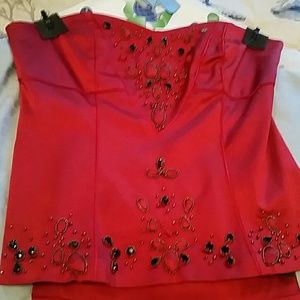 Sleeveless jeweled shell and matching skirt